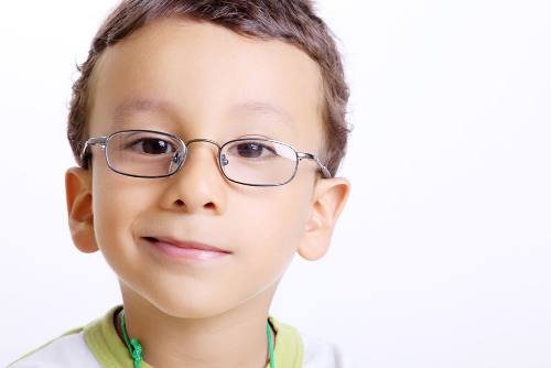 a boy wearing a pair of eyeglasses